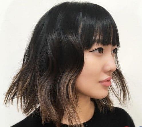 A classic bob with long layers and bangs